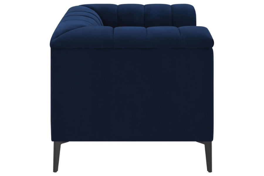 Sillón capitoné con brazos tipo smoking tapizado en color azul 509213