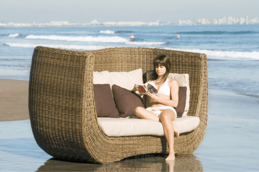 large scale designed loveseat styled daybed allows for easy placement poolside or on a balcony